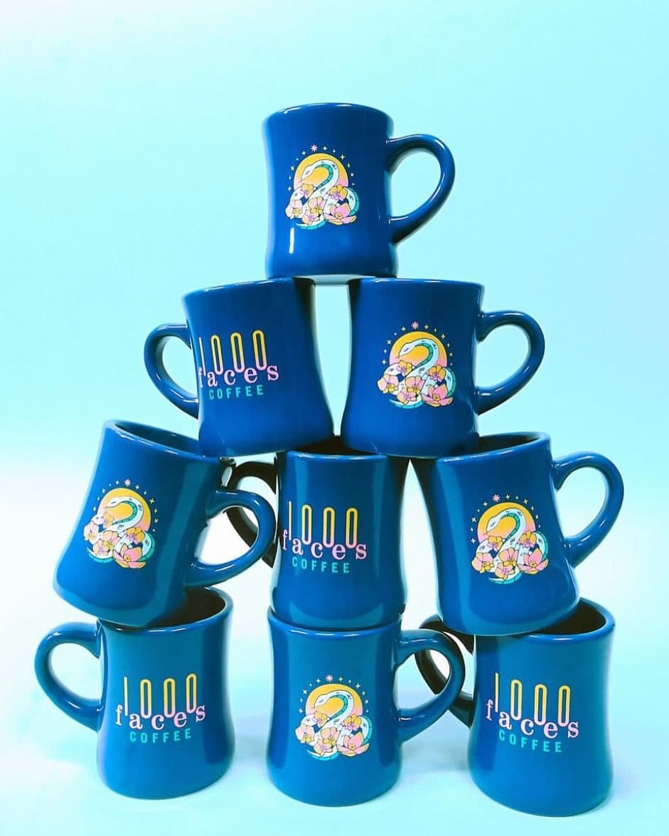 A pyramid of blue Year of the Snake mugs